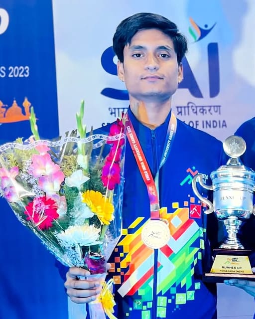 Dalip Singh with his Yogasana medal and trophy